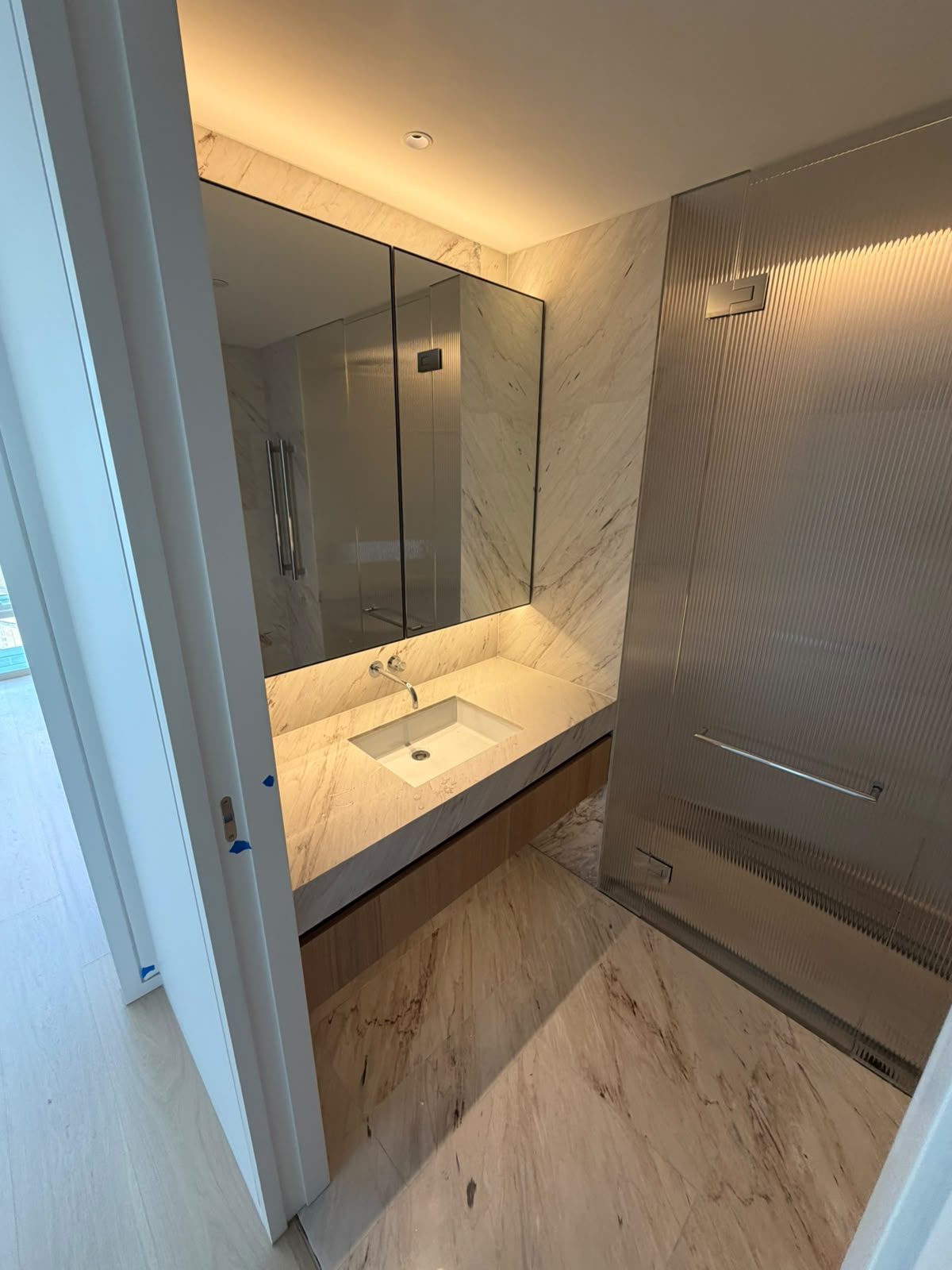 Bathroom renovation by Alta-Reno Services — vanity and glass shower